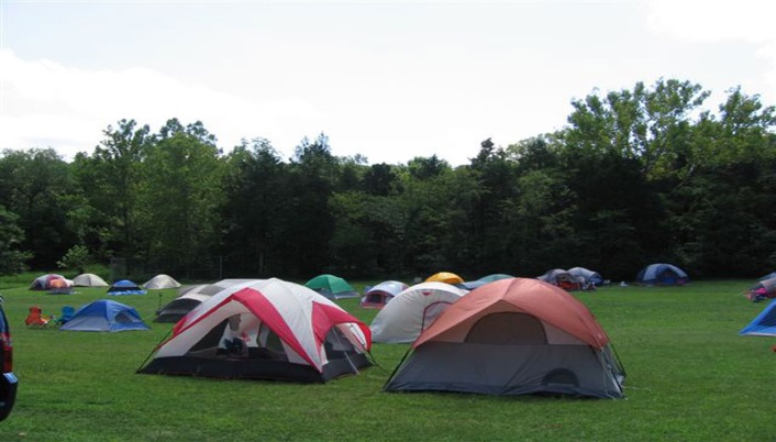 Image of multiple tents camping